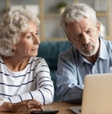 retired couple doing taxes