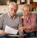 older couple reviewing papers