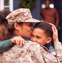 Female military mom with children