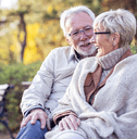 Older couple sitting on bench