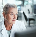 Older woman working in a lab