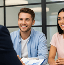 Young couple talks to investment counselor