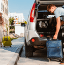 Young couple packing car 