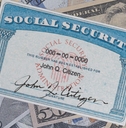 Social Security card on cash