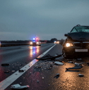 Car crash at night with police present