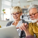Retired couple on laptop