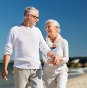 Older couple happy at the beach