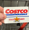 Costco membership card and shopping cart