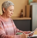 Senior woman reviewing paperwork
