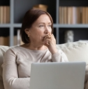 Pensive middle-aged woman
