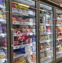 Frozen food aisle in grocery store