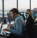 Air Traffic Control Team Working in a Modern Airport Tower