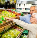 Senior couple grocery shopping