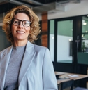 Smiling business woman in an office