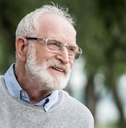 Smiling senior man in park