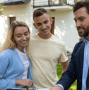 Real estate agent with couple 2
