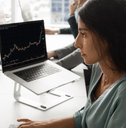 Woman checking stocks on computer