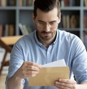 Person holding check