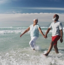 strolling retirees in beachwear