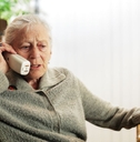 Concerned senior woman on phone