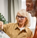 Retiree couple picking colors to remodel the house