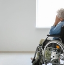 Senior woman in wheelchair indoors