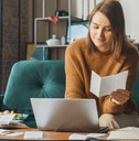 Woman doing taxes at home