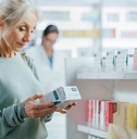 Senior woman shopping at pharmacy