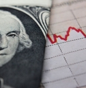 Dollar bill and downward graph