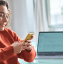 Young woman checking mobile banking on phone