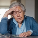 Senior woman worried about money