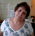 Woman in her 60s looking sad