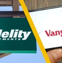 Fidelity Investments sign and Vanguard on mobile phone