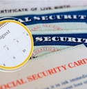 Social Security cards with August calendar