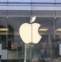 HONG KONG, APRIL 10: apple store logo with hong kong skyline in Central