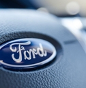 Ford sign on steering wheel close up
