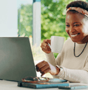Woman checking her online banking on laptop