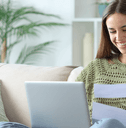Woman doing online banking at home