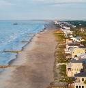 aerial view of shoreline and landscape of folly beach town near charleston