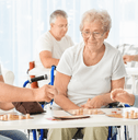Retirees playing game at community center