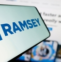 Ramsey Solutions Logo on Cellphone