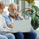 Senior couple looking at retiring and savings