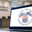 Social Security Administration building and laptop screen