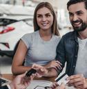 Couple buying a car