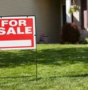 sign in front of home