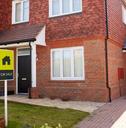 exterior of house with sold sign