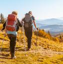 elderly people with large backpacks