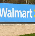 walmart roadside store sign in daylight green grass