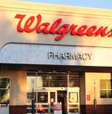 Storefront of a Walgreens Pharmacy building showing brand logo in Arizona