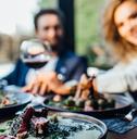 two person eating salad